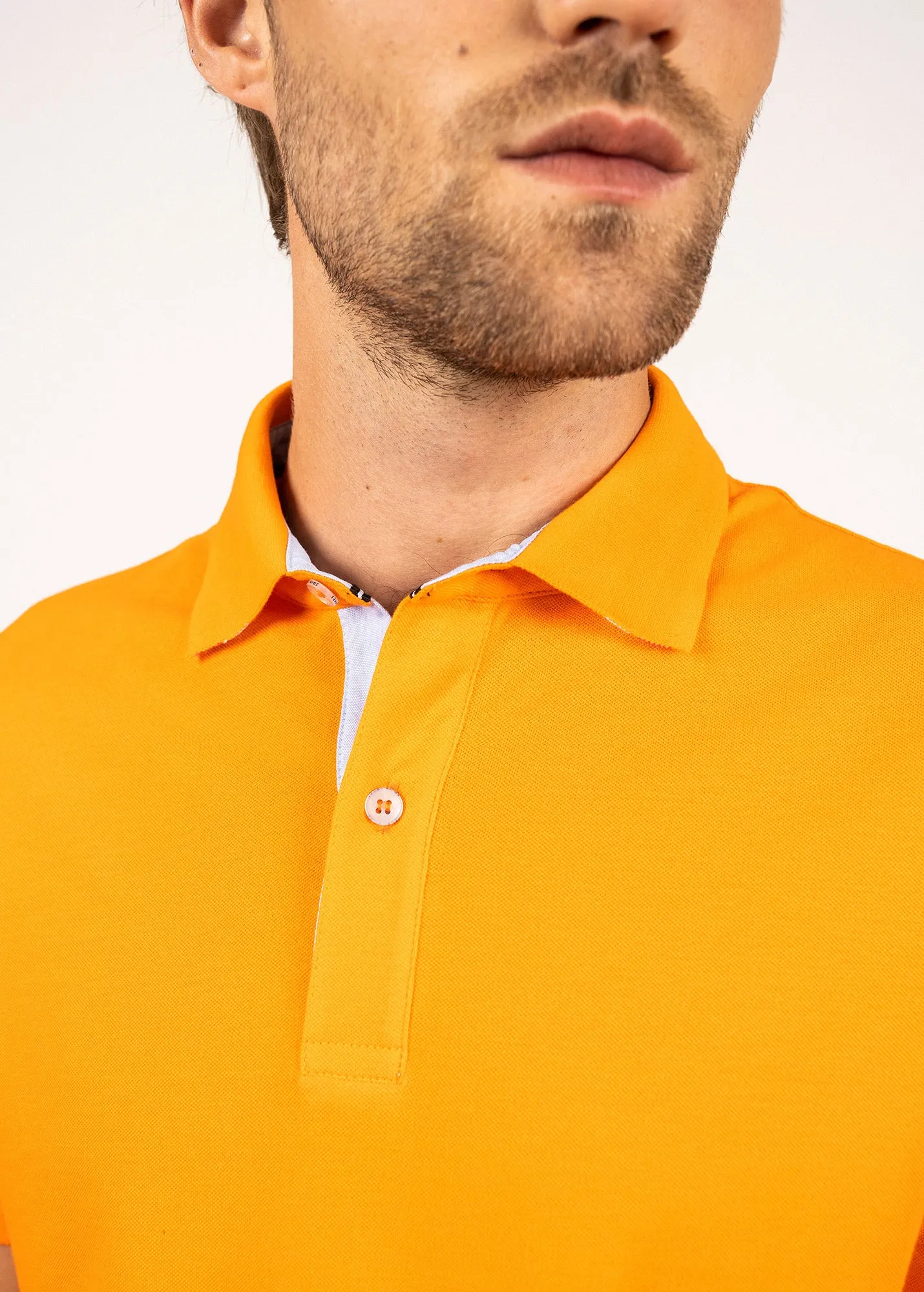 Rayan polo shirt in cotton stretch - pique knit, embroidered (TANGERINE)